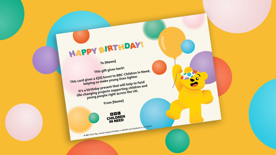 Gift Card for Happy Birthday with spots and a Pudsey bear holding balloons